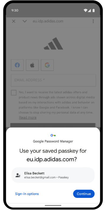 Android 设备上显示的一条系统级通行密钥提示，询问用户是否要使用已保存的通行密钥登录 adidas 身份提供方。